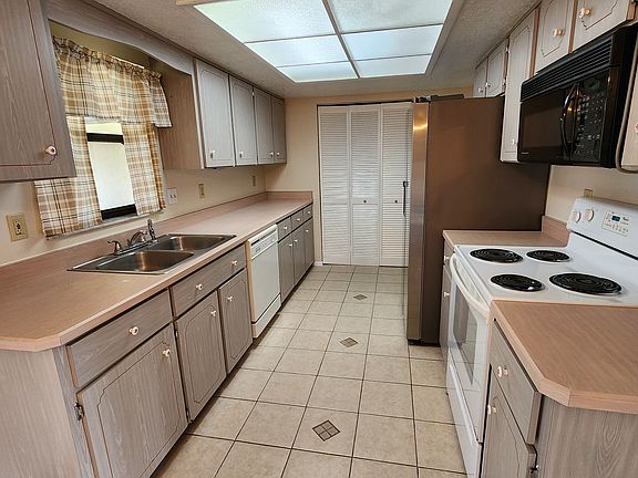 Kitchen & Pantry which leads to the garage