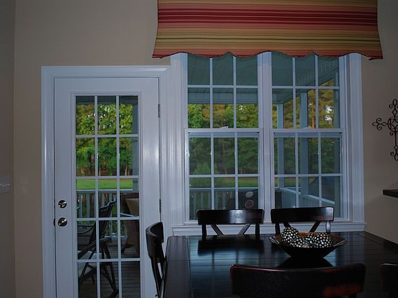 view onto porch from breakfast table