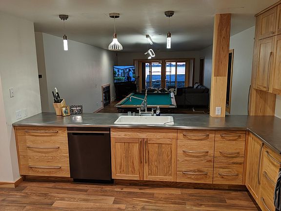 Back wall of kitchen to the outside.