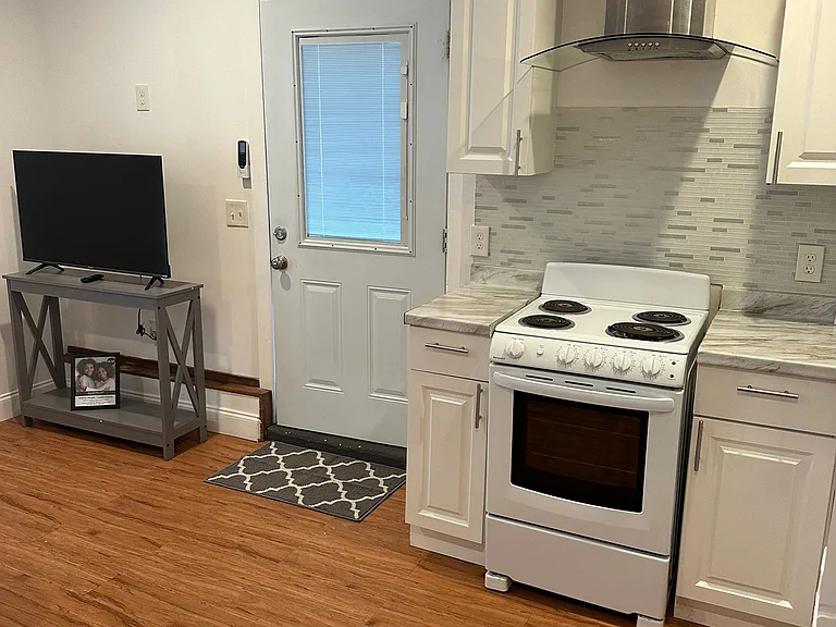 Equipped with a stove and oven for your cooking needs.