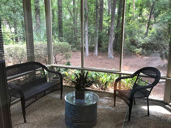 Screened in porch located off of living room.