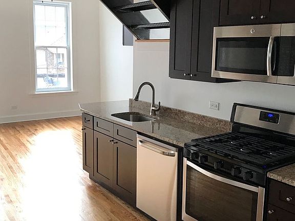 3rd image of 1643 S Throop St #8929517