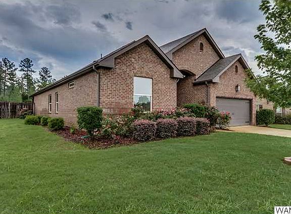 View of the side yard with new landscaping.