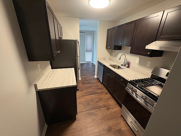 The kitchen has all new appliances, cabinets and granite countertops