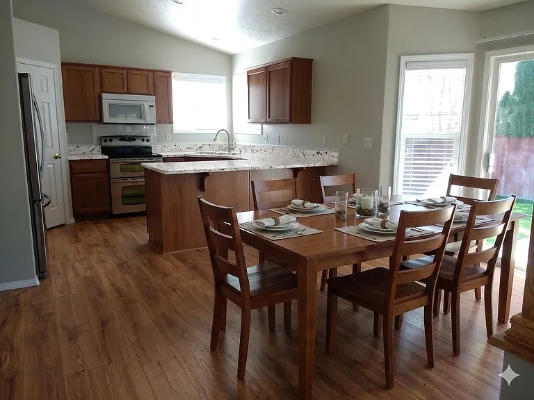 Dining room (staged, with the counters, floor, and cabinets that are on order)