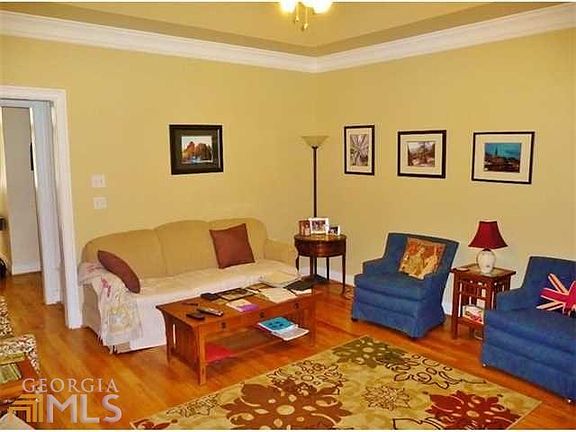 Living room with entry foyer to the left.