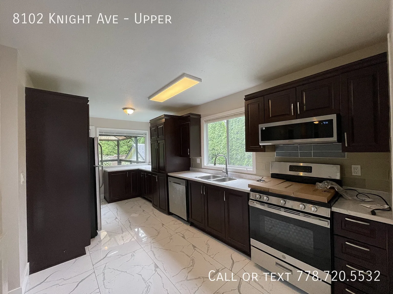 Upper Suite with 3 Bedrooms plus Den and 2 Baths — Photo 3