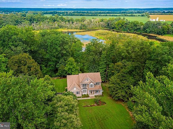aerial view overlooking creek access from property