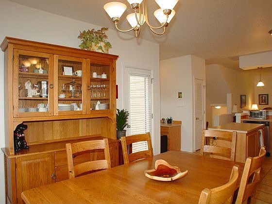 Spacious Dining Area with glass door to deck just perfect for BBQs!