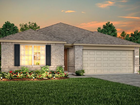The Serenada, a one-story home with 2-car garage, shown with Home Exterior N