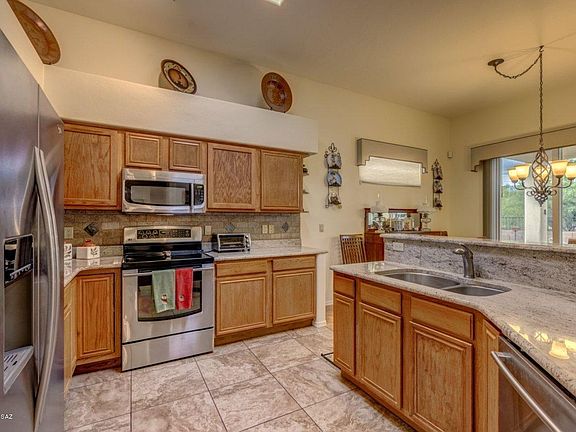 5th image of 8889 E Windflower Dr