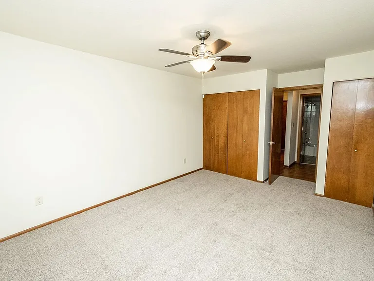 Welcome to Central Lakes of Uptown, where spacious living meets comfort. This airy room features a ceiling fan and ample closet space, perfect for your personal touch. Schedule your tour today and make this space your new home!