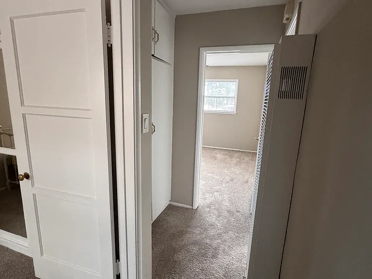 View from the bathroom into the bedrooms