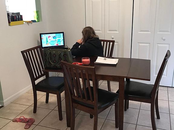 Breakfast nook w cable to ca and access to second balcony. 