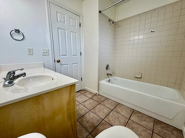 Second bath _ metal tub and tile surround
