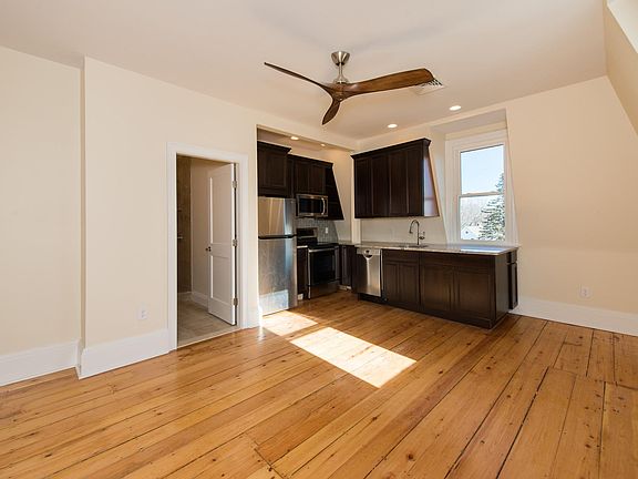 Refinished original hardwood floors.