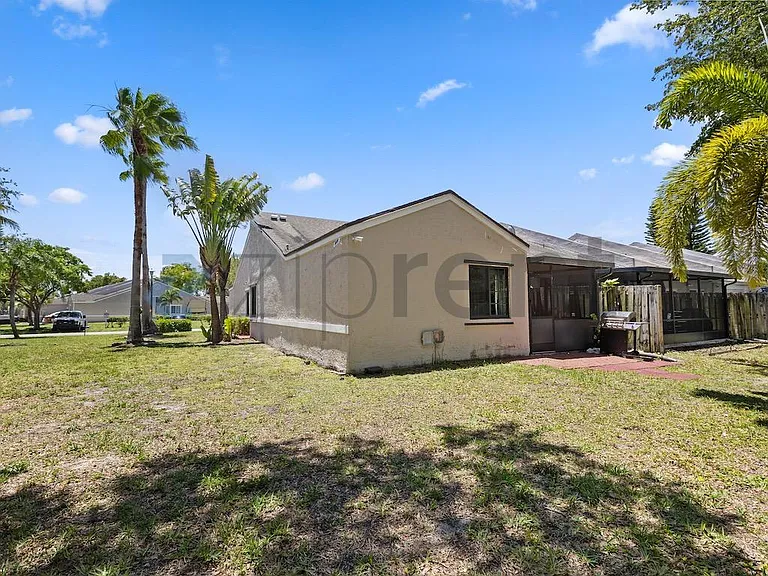 5140 NW 11th Dr — Photo 29