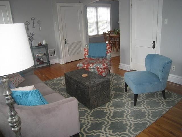 LIVING ROOM The living room has 2 large windows