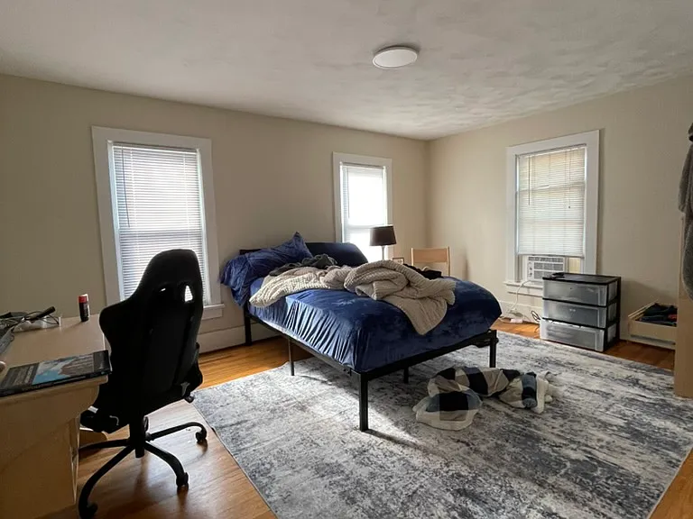 Bedroom 1: Our NEW furniture; photo shows student belongings.