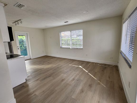 living/dining area with access to garden area