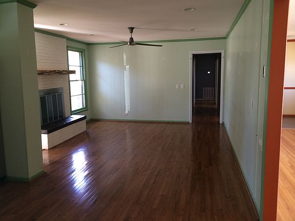 Wood fireplace in the small living room.