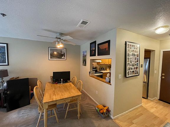 Dining Area and Pass Through, Entry Hall and Chef's Kitchen