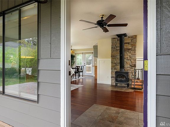 As you enter.  Stove is wood burning.