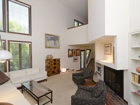 2 story living room with addicting western views