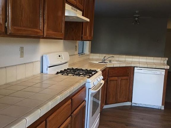 Spacious Tile Kitchen Counters, Double Sinks, Gas Stove/Oven, Dishwasher