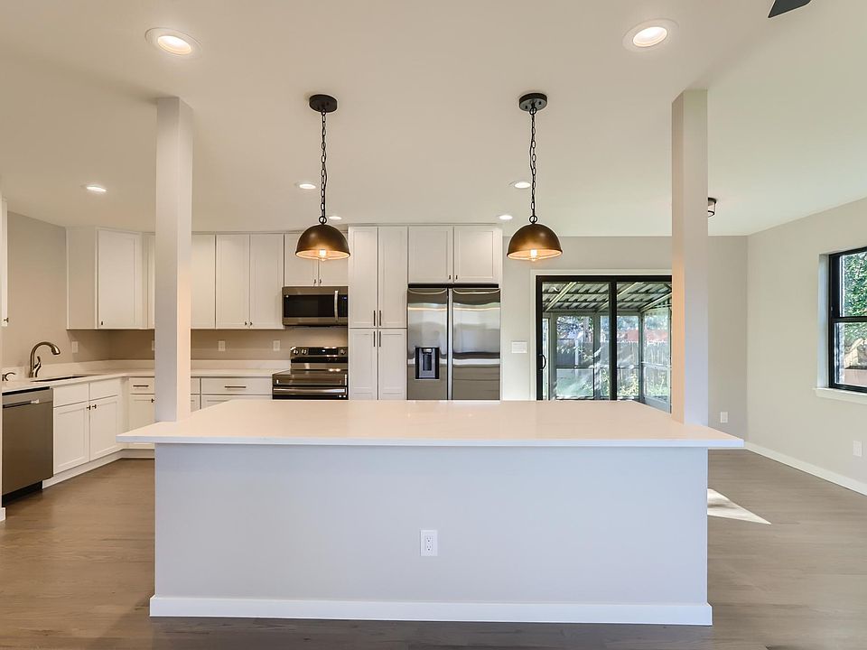 Kitchen view from the island and family room.
