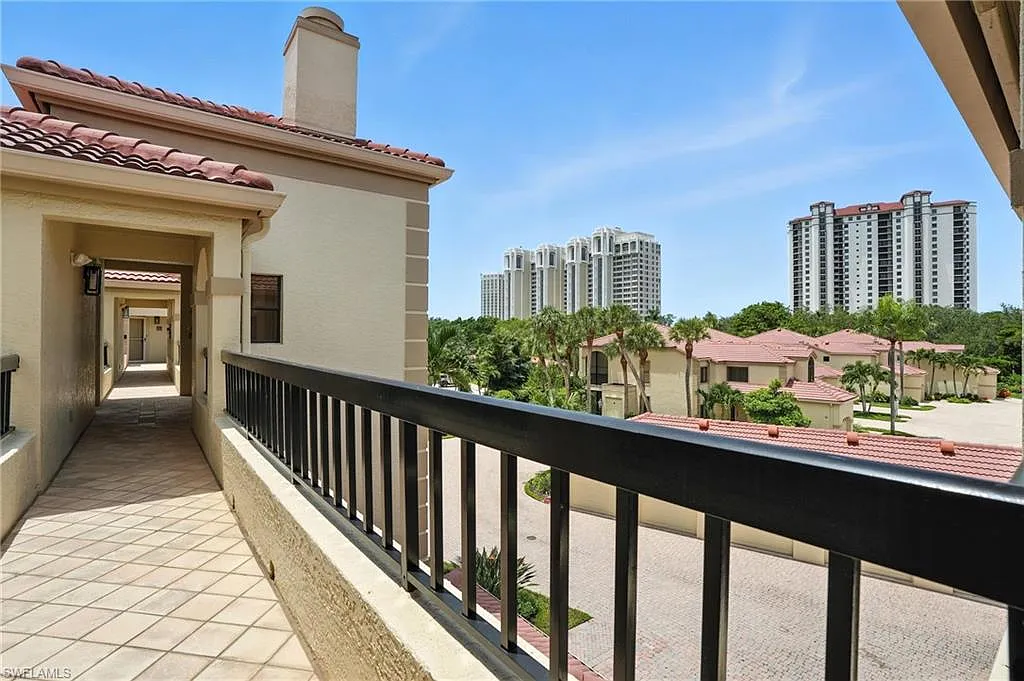 Building Photo - 7032 Pelican Bay Blvd #E-304