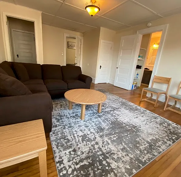 Livingroom comes furnished as shown.
