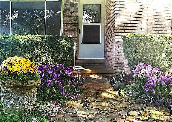 flowers in bloom front porch