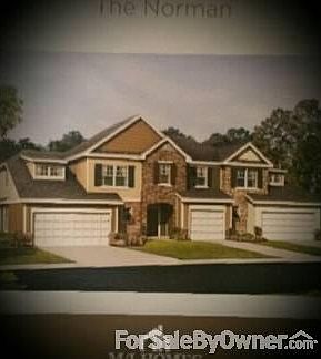 Front of House
						:
						End Unit with two-car garage
