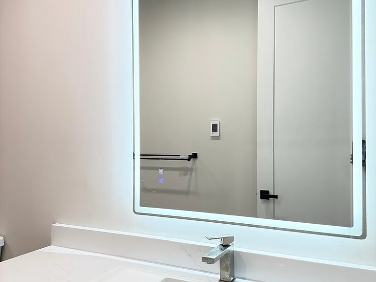 Back lit large mirror with defogger built in
