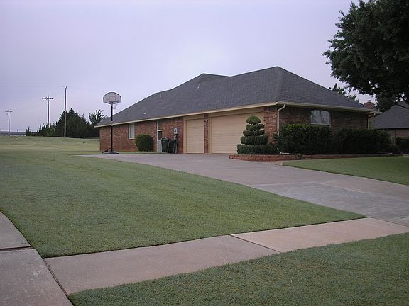 Side of house and yard