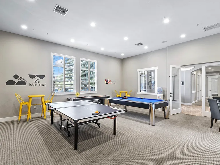 Take advantage of a resident game room that blends entertainment and community energy