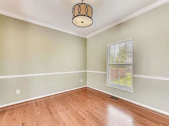 Dining room, from kitchen, open on left to the formal living room.