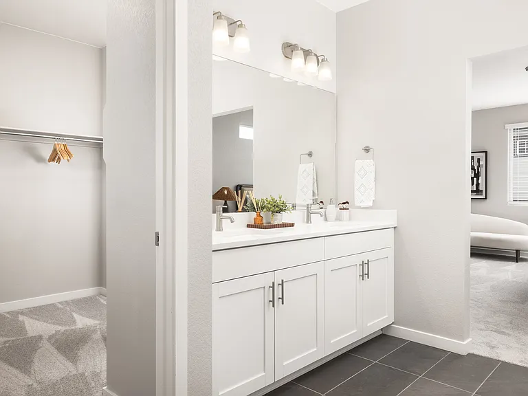 Dual-sink vanities in primary bathrooms.*