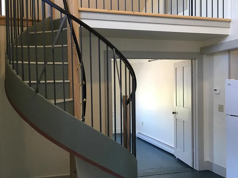custom spiral staircase to loft/office/studio space