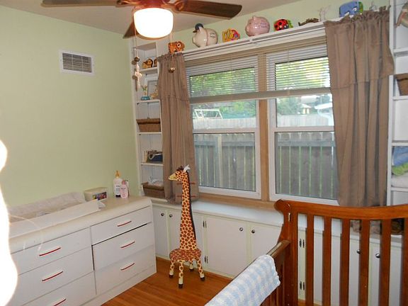 Bedroom #3, huge window with built-ins and full closet
