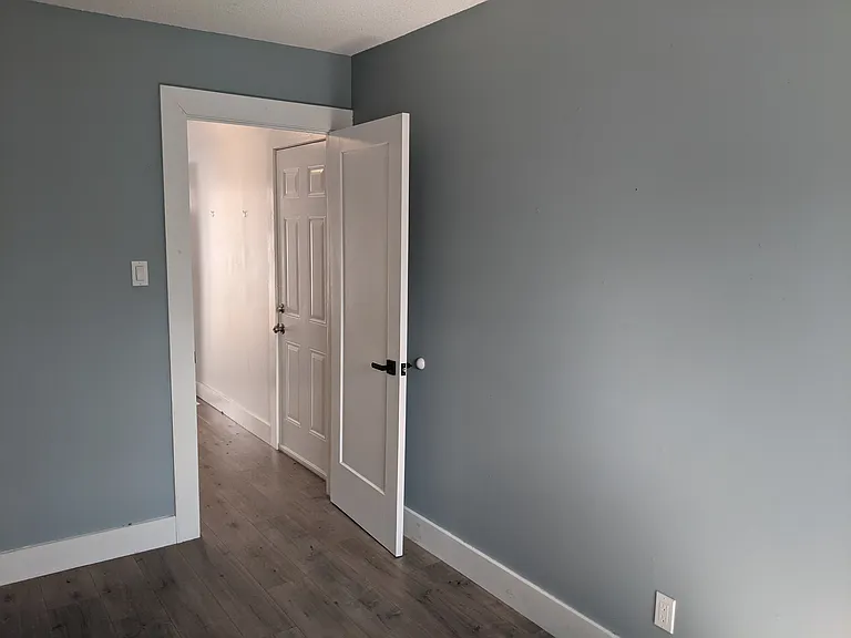 This house is a side split with 3 bedrooms on the top floor. The fourth bedroom/office is located on the main floor.