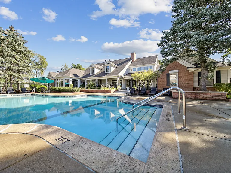 Relax, recharge, and enjoy sunny days by the community pool.