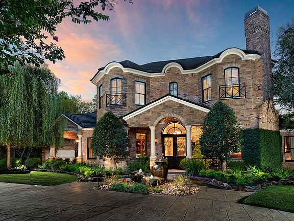 Historically accented luxury manor located in prestigous golf course community, Carlton Woods, Nicklaus.