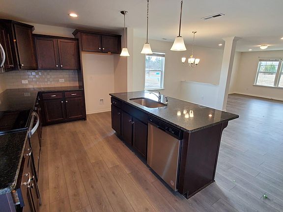 View from Kitchen. Modern Plan with Dining and Living from Kitchen.
