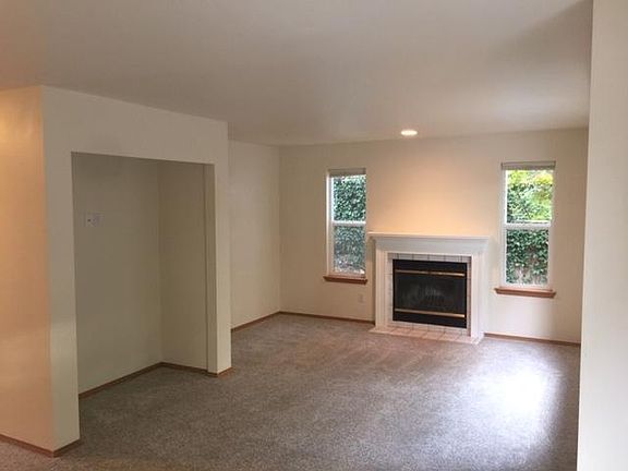 Den with fireplace
