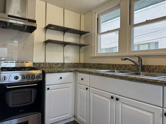 Beautiful Updated Kitchen with Granite Counters and Stainless Steel Appliances