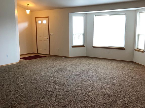 Spacious living area with vaulted ceiling