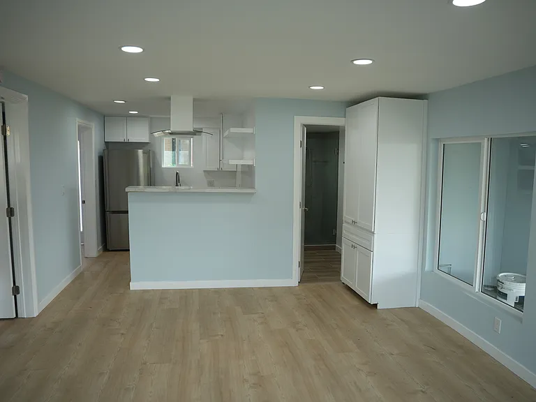 Living room looking to kitchen