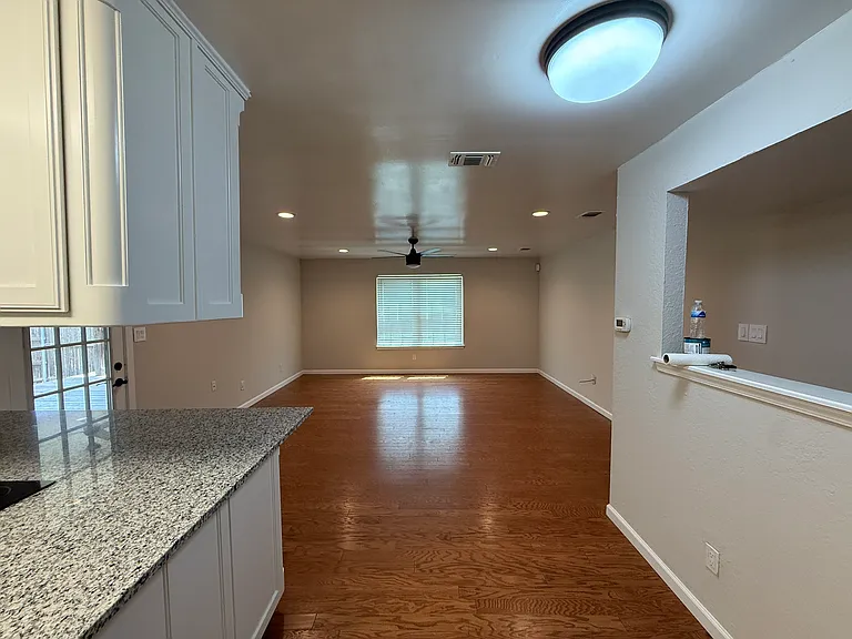 Kitchen looking into living room